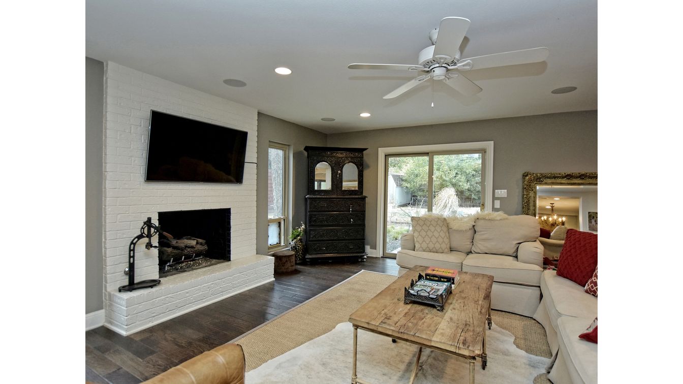 Fireplace, Interior, Living room, Recessed Lighting, Stone Walls, Wood Texture Flooring