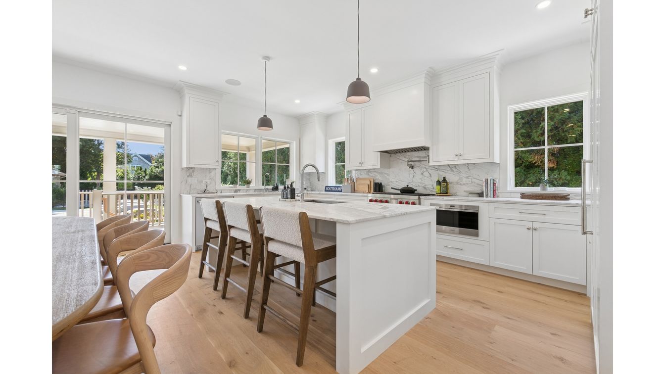Interior, Kitchen, Marble Walls, Pendant Lights, Recessed Lighting, Stainless Steel Appliances, Wood Texture Flooring