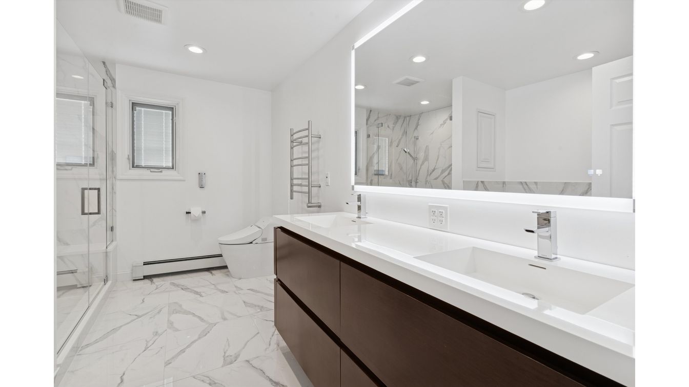 Bathroom, Dual Sink Vanities, Glass Shower, Interior, Marble, Marble Walls, Recessed Lighting