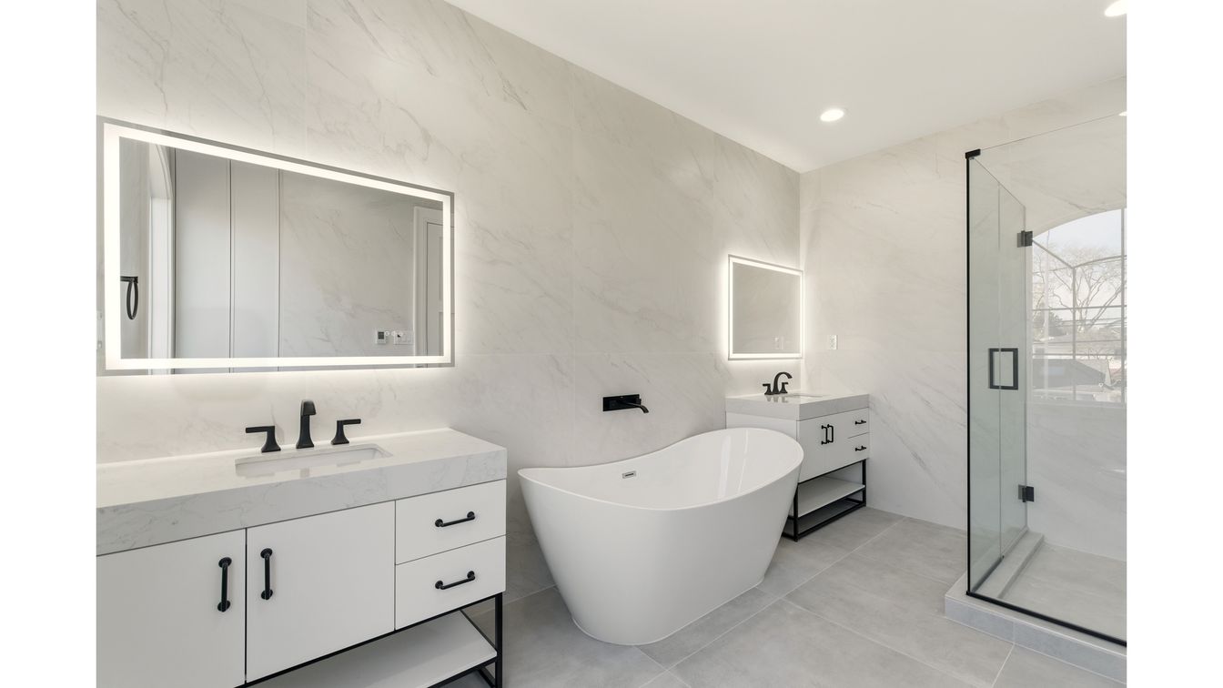 Bathroom, Dual Sink Vanities, Free Standing Baths, Glass Shower, Interior, Marble Walls, Recessed Lighting