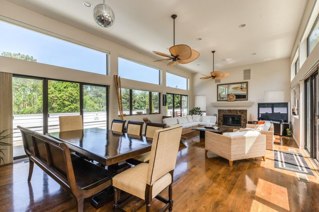 Dining room, Fireplace, Interior, Living room, Pendant Lights, Recessed Lighting, Wood Texture Flooring