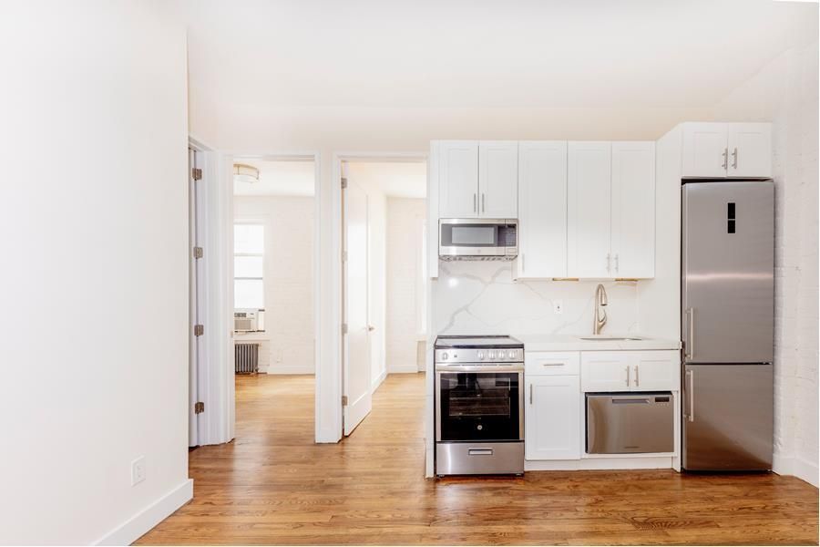 Interior, Kitchen, Marble Walls, Stainless Steel Appliances, Wood Texture Flooring