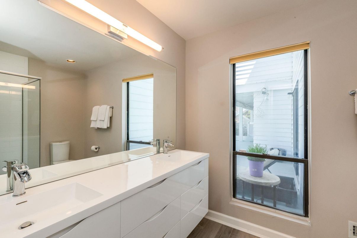 Bathroom, Dual Sink Vanities, Glass Shower, Interior, Recessed Lighting, Wood Texture Flooring