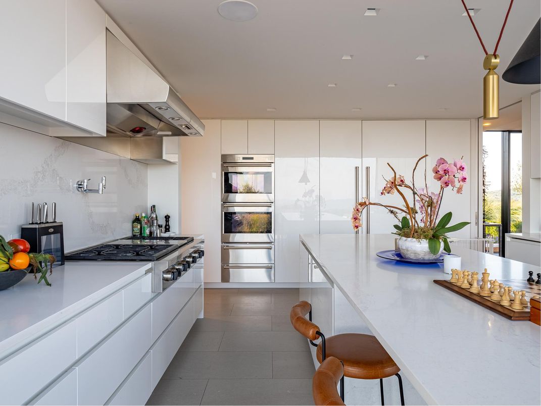 Interior, Kitchen, Marble Walls, Recessed Lighting, Stainless Steel Appliances