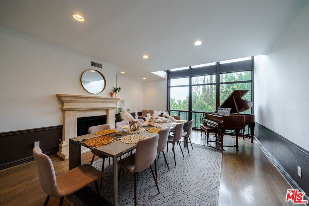 Dining room, Fireplace, Interior, Piano, Recessed Lighting, Wood Texture Flooring