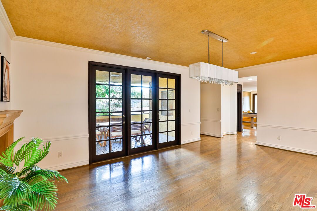 Chandelier, Empty room, Fireplace, Interior, Pendant Lights, Recessed Lighting, Wood Texture Flooring