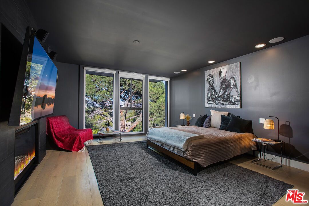 Bedroom, Fireplace, Interior, Recessed Lighting, Wood Texture Flooring