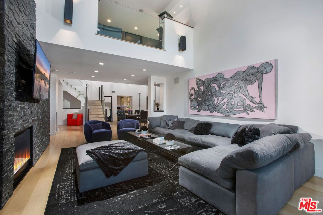 Dining room, Fireplace, Interior, Living room, Recessed Lighting, Wood Texture Flooring