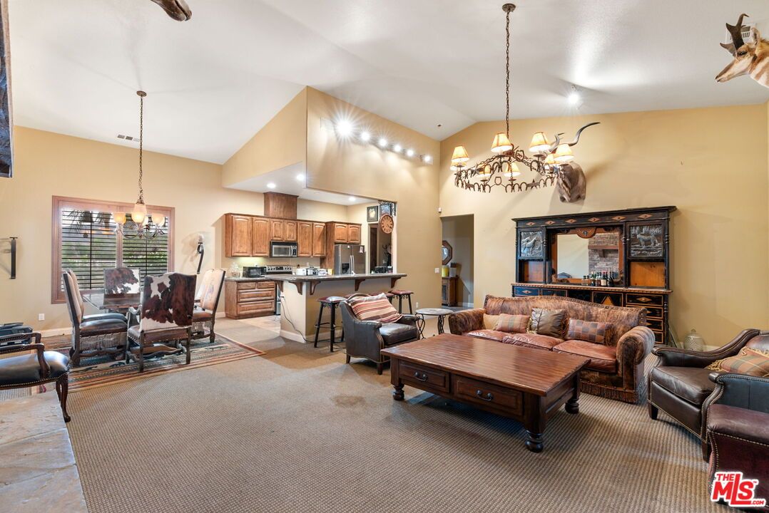 Chandelier, Dining room, Interior, Kitchen, Living room, Pendant Lights, Recessed Lighting, Stainless Steel Appliances