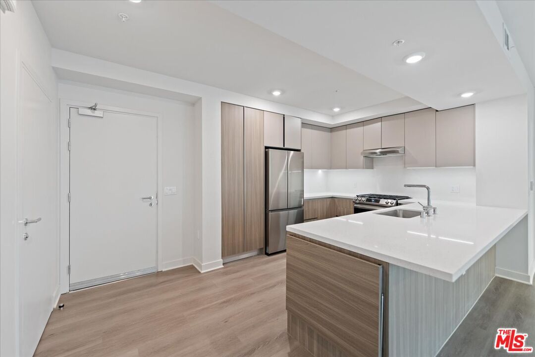Interior, Kitchen, Recessed Lighting, Stainless Steel Appliances, Wood Texture Flooring