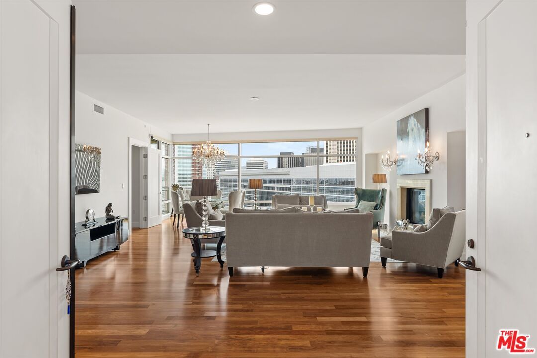 Chandelier, Dining room, Fireplace, Interior, Living room, Recessed Lighting, Wood Texture Flooring