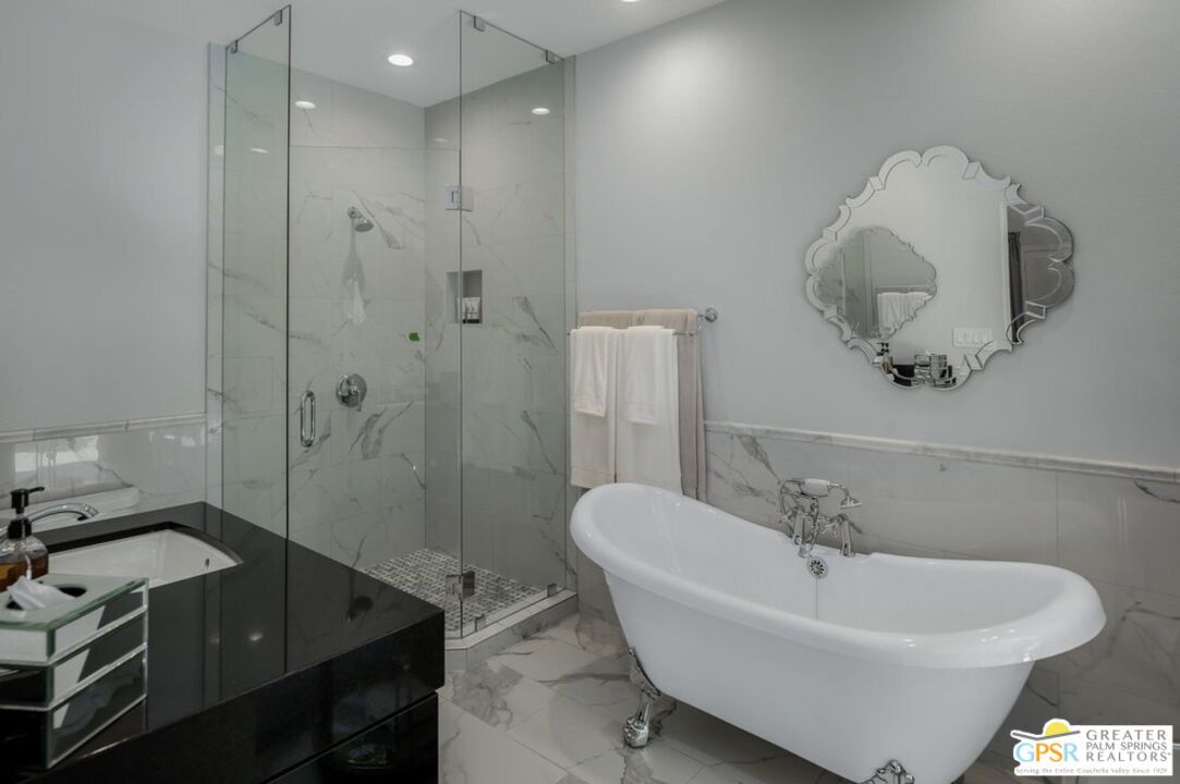 Bathroom, Free Standing Baths, Glass Shower, Interior, Marble, Marble Walls, Recessed Lighting