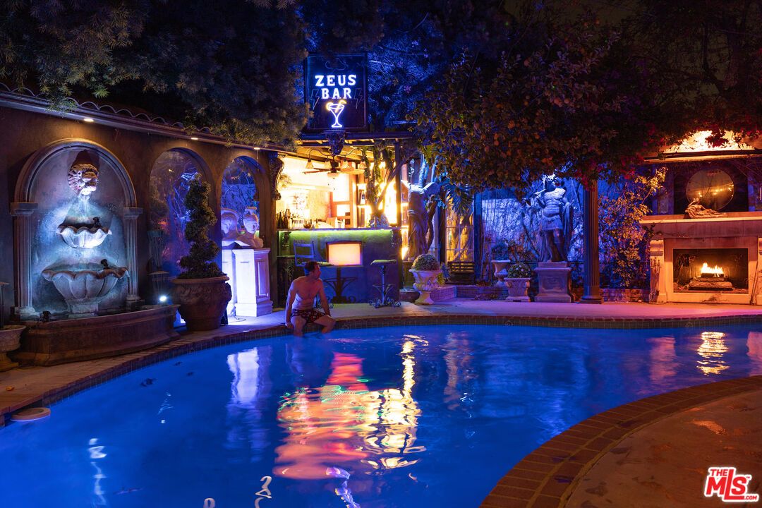 Exterior, Fireplace, Pool