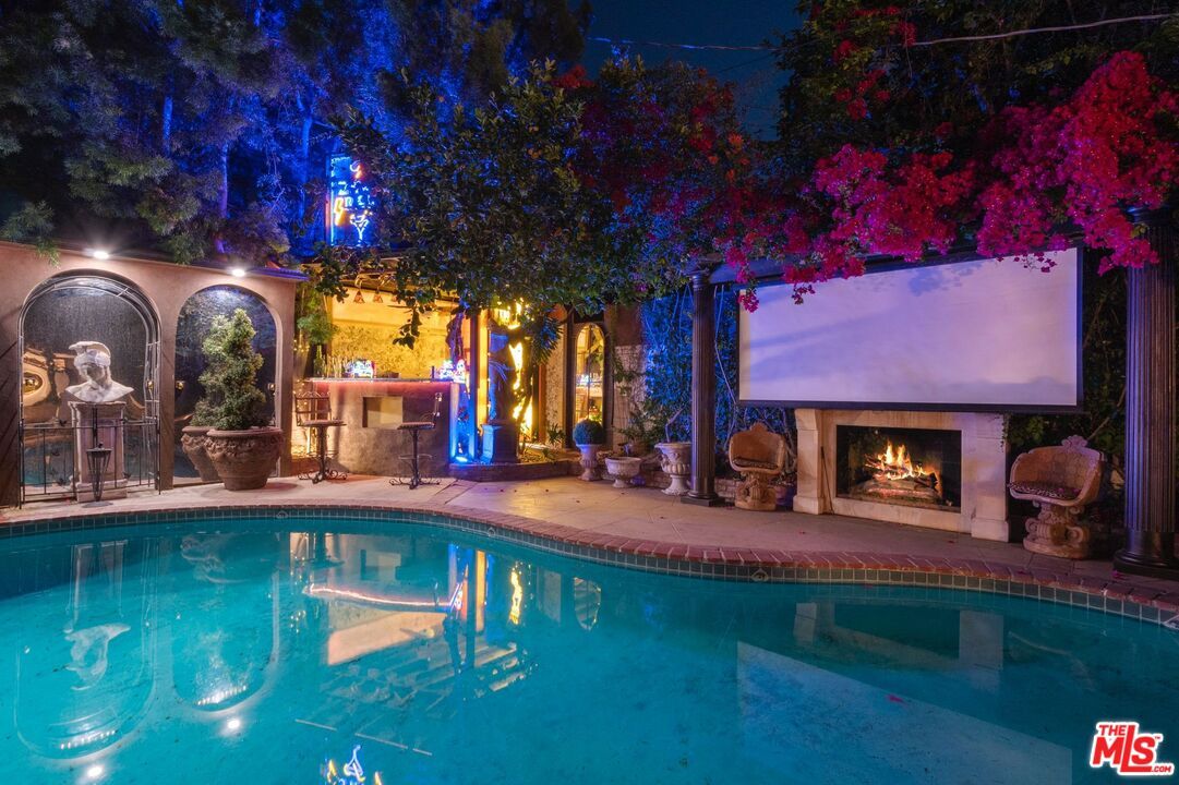 Exterior, Fireplace, Pool