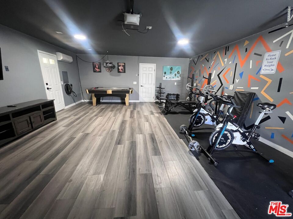 Billiard Table, Fitness Equipment, Game Room, Interior, Recessed Lighting, Wood Texture Flooring