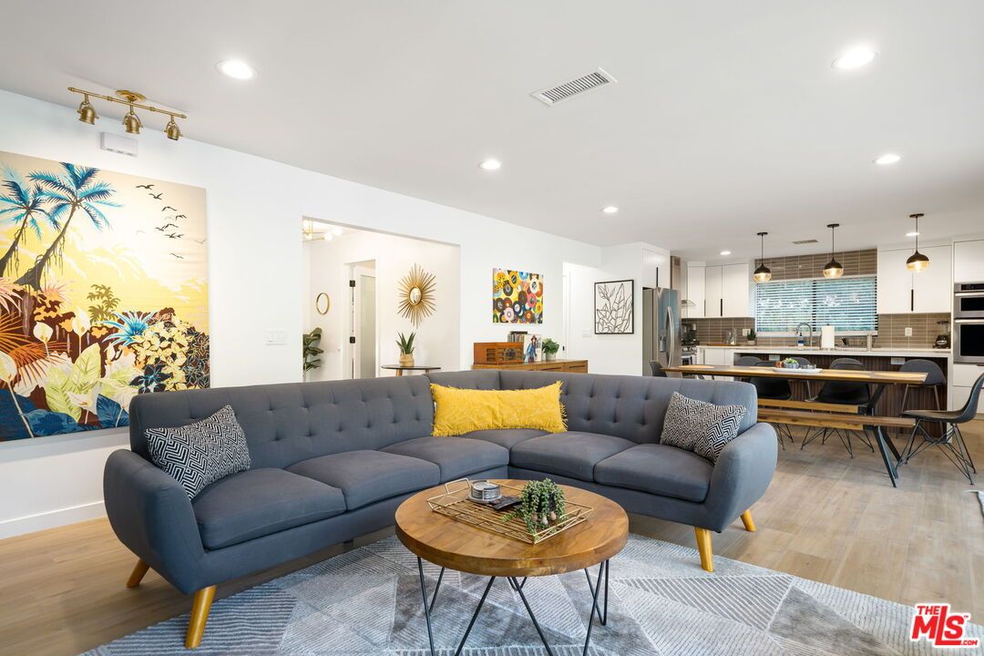 Dining room, Interior, Kitchen, Living room, Pendant Lights, Recessed Lighting, Stainless Steel Appliances, Wood Texture Flooring