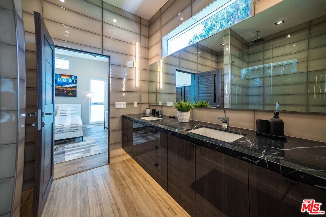 Bathroom, Dual Sink Vanities, Glass Shower, Interior, Recessed Lighting, Wood Texture Flooring