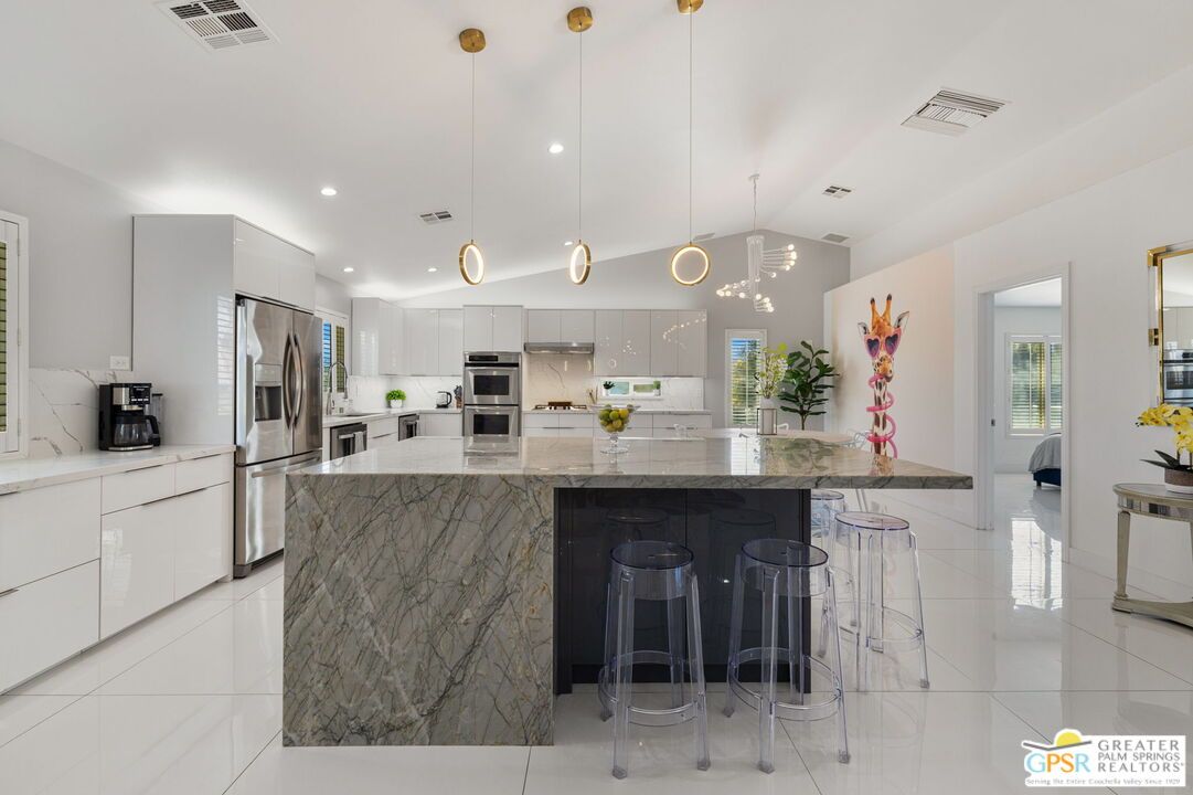 Interior, Kitchen, Marble, Marble Walls, Pendant Lights, Recessed Lighting, Stainless Steel Appliances