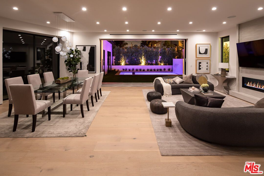 Dining room, Fireplace, Interior, Living room, Pendant Lights, Recessed Lighting, Wood Texture Flooring