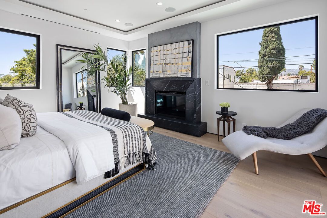 Bedroom, Fireplace, Interior, Recessed Lighting, Wood Texture Flooring