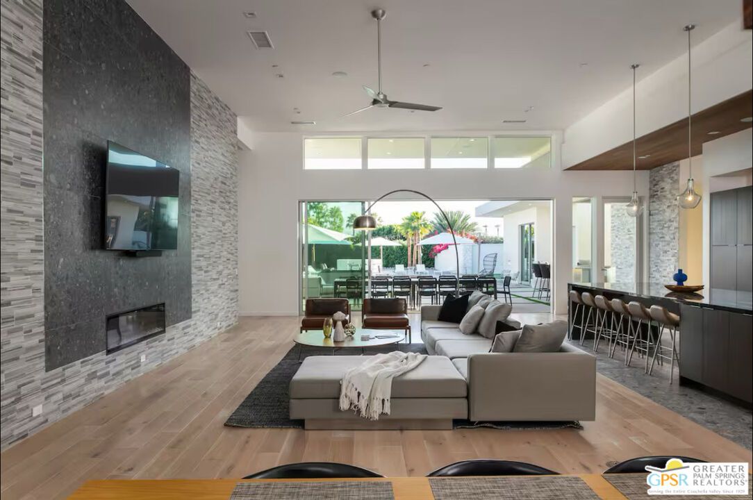 Dining room, Fireplace, Interior, Living room, Pendant Lights, Recessed Lighting, Stone Walls, Wood Texture Flooring