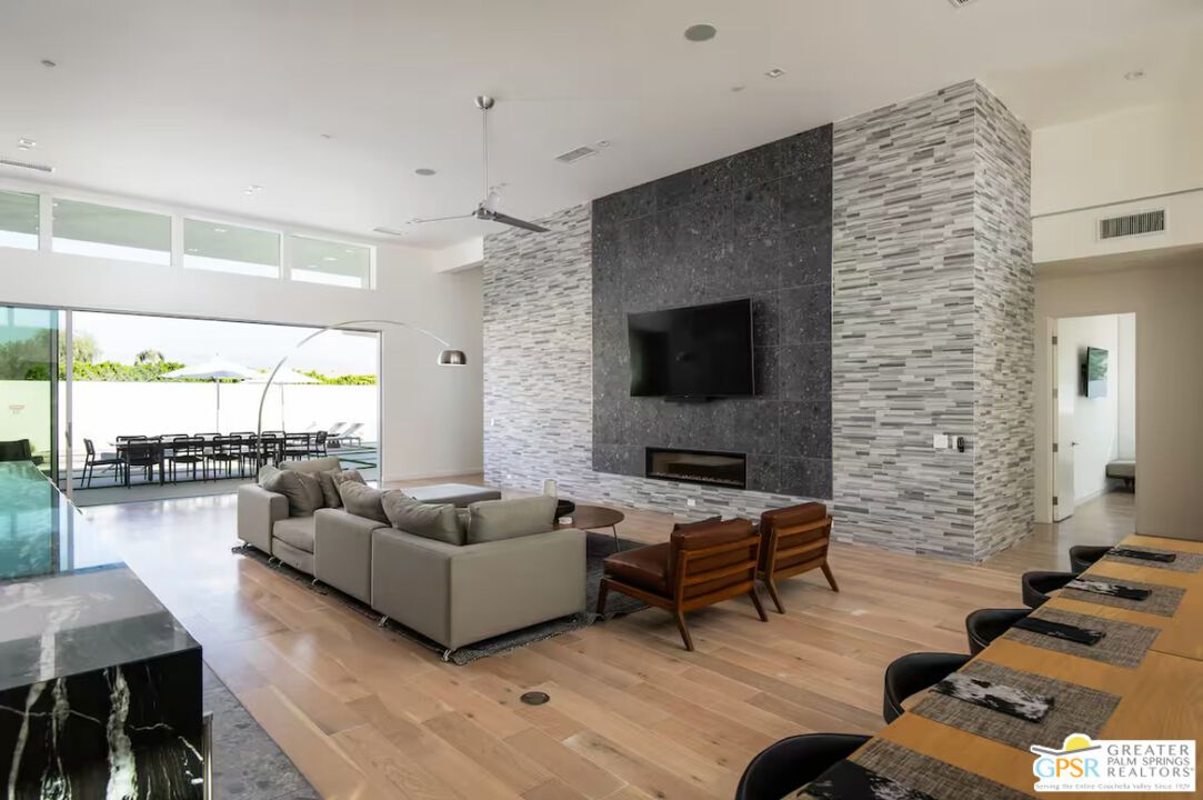Fireplace, Interior, Living room, Pendant Lights, Recessed Lighting, Stone Walls, Wood Texture Flooring