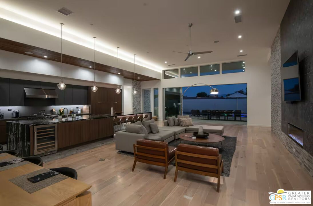 Fireplace, Interior, Kitchen, Living room, Pendant Lights, Recessed Lighting, Stainless Steel Appliances, Wood Texture Flooring