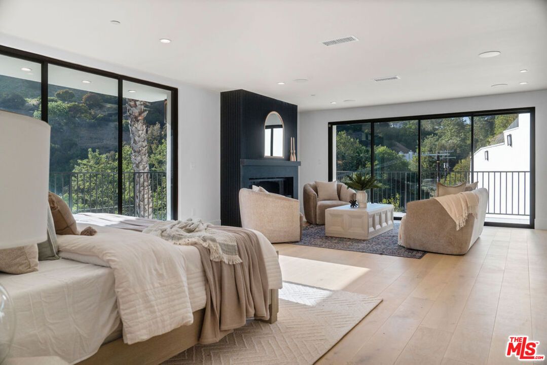 Bedroom, Fireplace, Interior, Recessed Lighting, Wood Texture Flooring