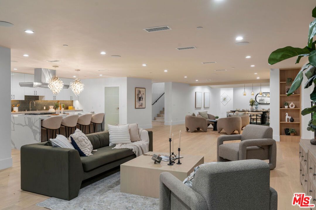 Chandelier, Dining room, Interior, Kitchen, Living room, Pendant Lights, Recessed Lighting, Wood Texture Flooring