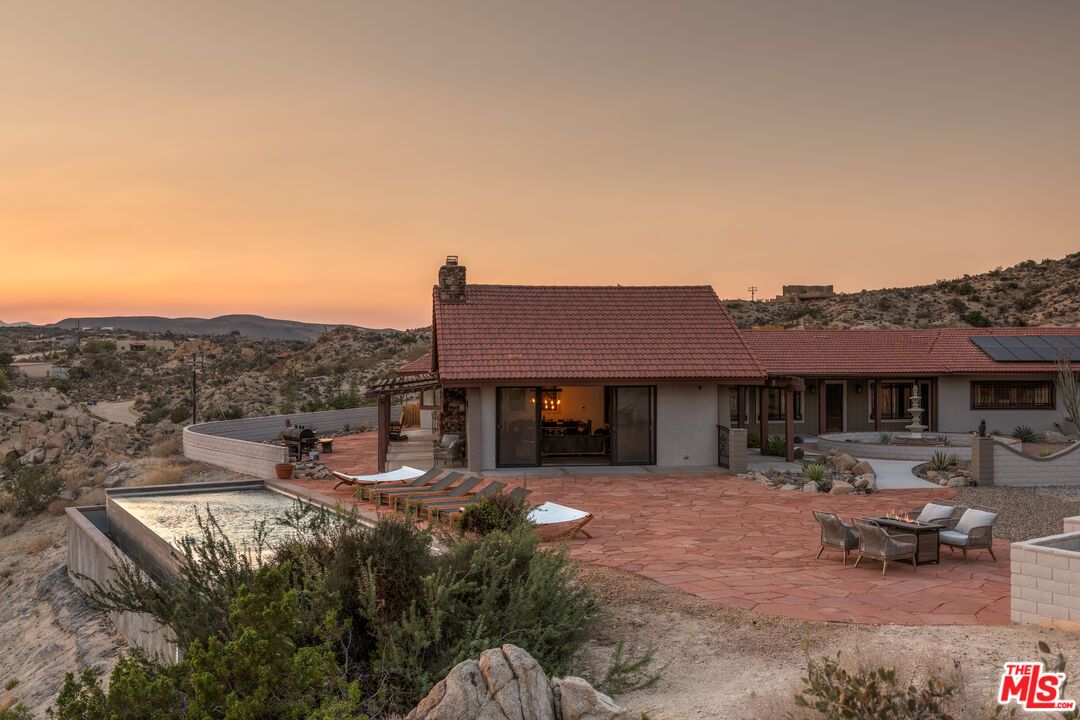 Exterior, Pool, Solar Panels