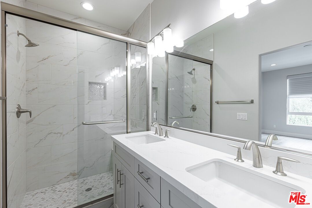 Bathroom, Dual Sink Vanities, Glass Shower, Interior, Marble Walls, Recessed Lighting