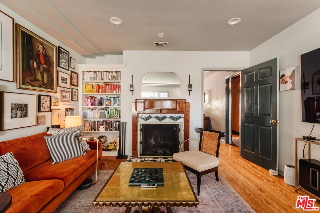 Fireplace, Interior, Living room, Recessed Lighting, Wood Texture Flooring