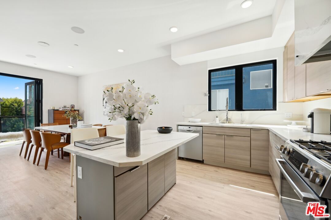 Dining room, Interior, Kitchen, Recessed Lighting, Stainless Steel Appliances, Wood Texture Flooring