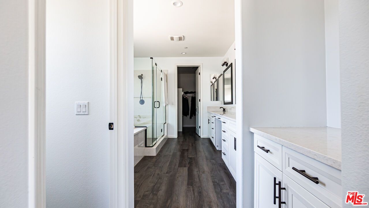 Bathroom, Dual Sink Vanities, Interior, Recessed Lighting, Wood Texture Flooring