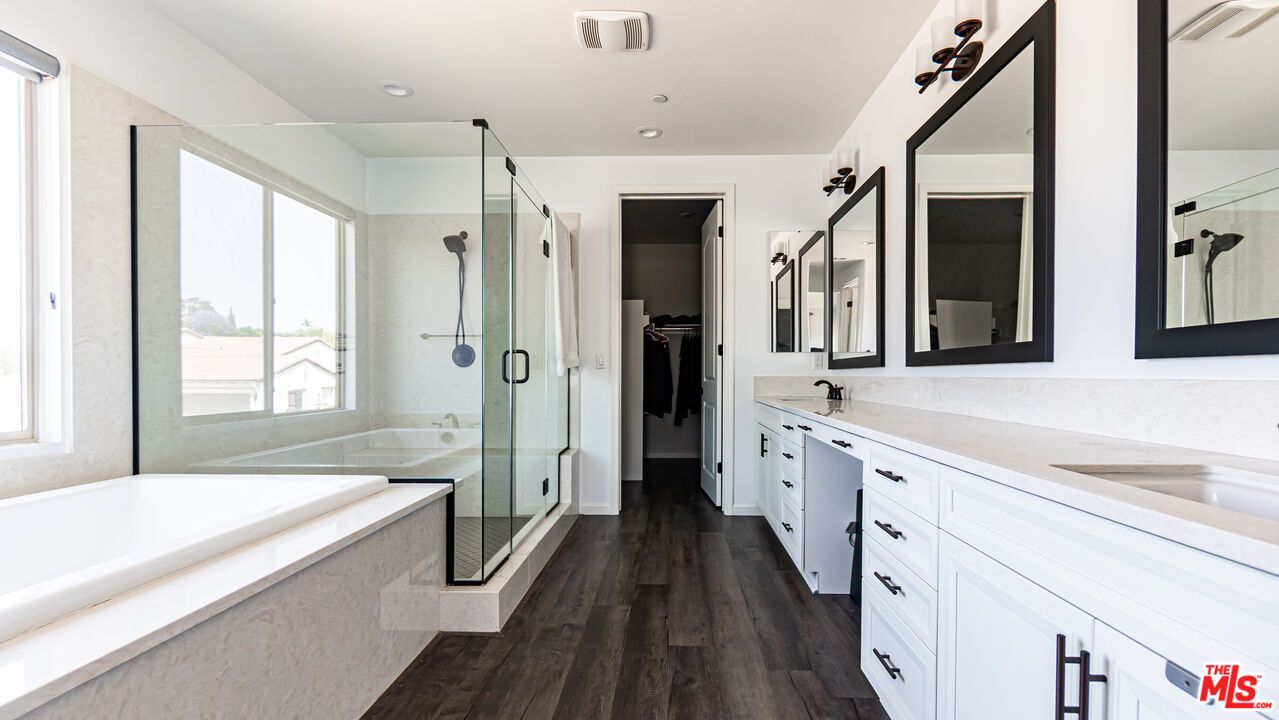 Bathroom, Dual Sink Vanities, Glass Shower, Interior, Recessed Lighting, Wood Texture Flooring