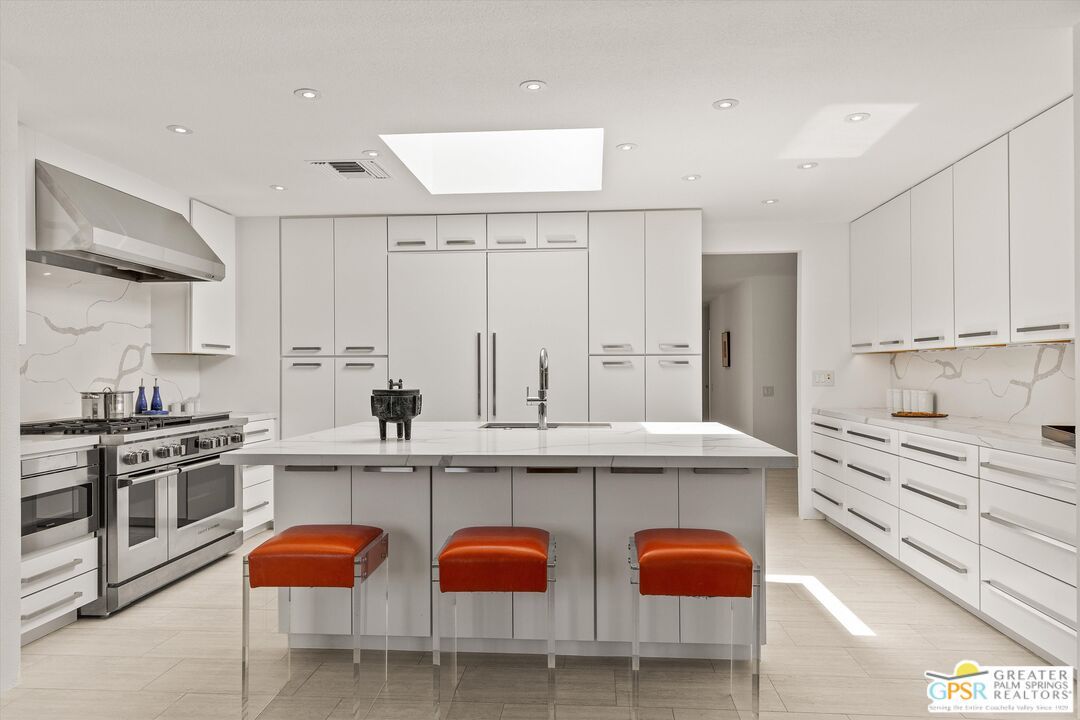 Interior, Kitchen, Marble Walls, Recessed Lighting, Stainless Steel Appliances