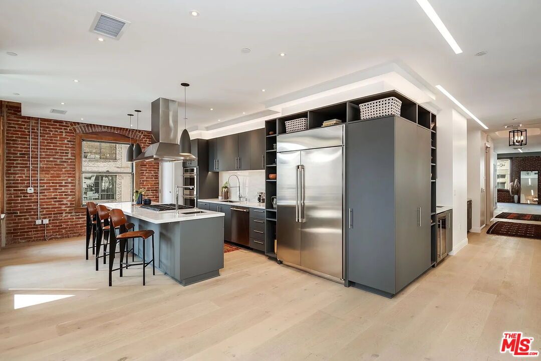 Interior, Kitchen, Pendant Lights, Recessed Lighting, Stainless Steel Appliances, Stone Walls, Wood Texture Flooring