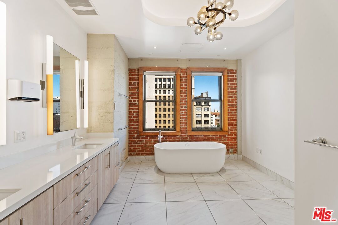 Bathroom, Dual Sink Vanities, Free Standing Baths, Interior, Marble, Pendant Lights, Recessed Lighting