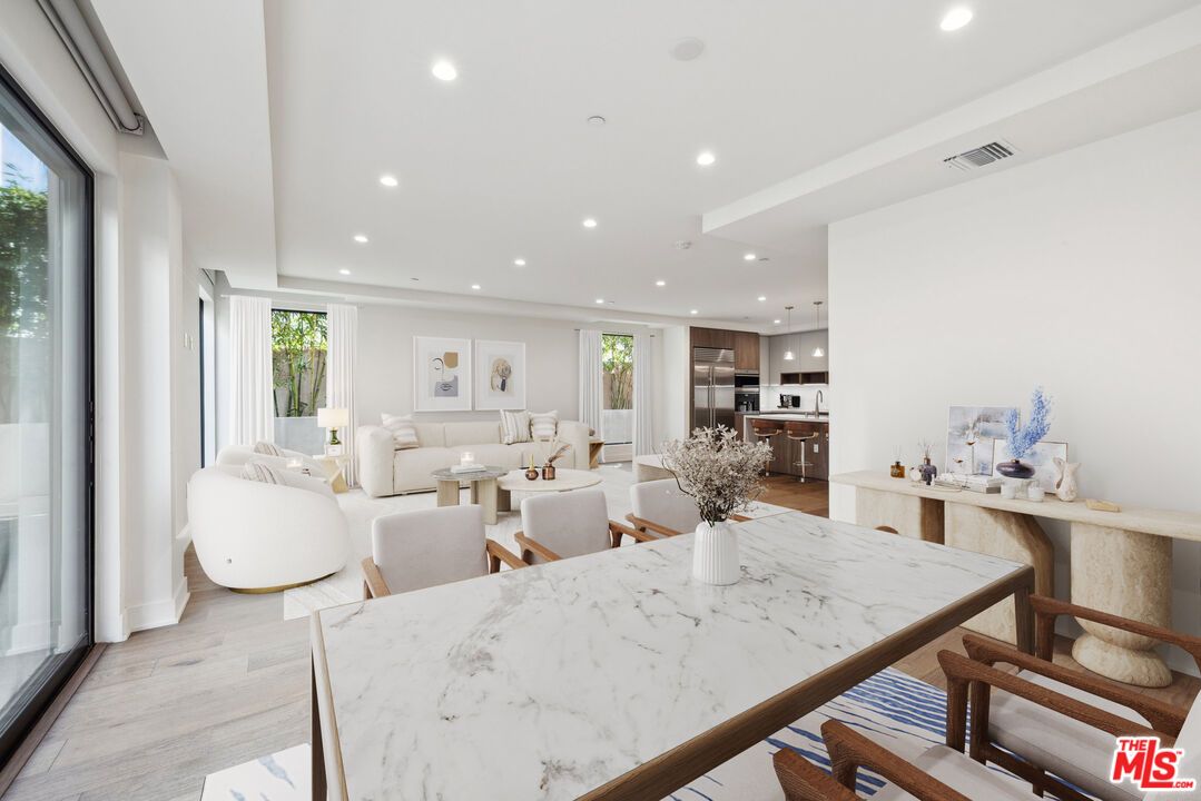 Dining room, Interior, Kitchen, Living room, Pendant Lights, Recessed Lighting, Stainless Steel Appliances, Wood Texture Flooring