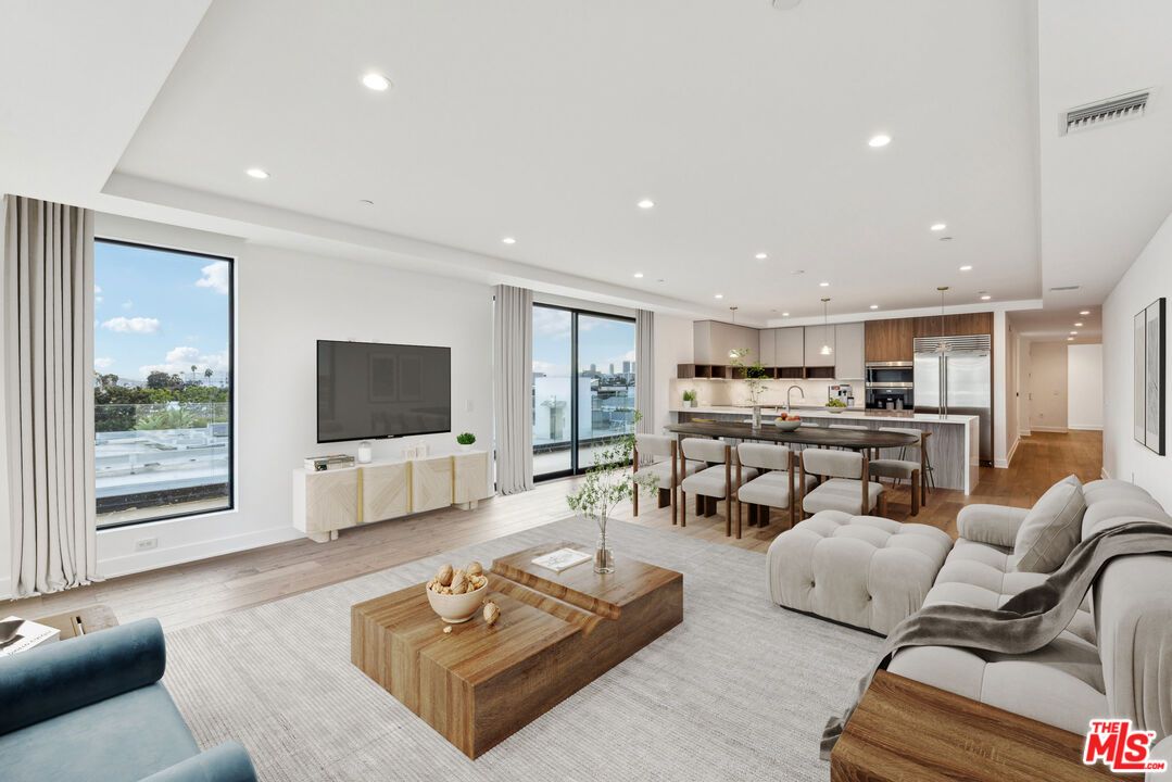 Dining room, Interior, Kitchen, Living room, Pendant Lights, Recessed Lighting, Stainless Steel Appliances, Water, Wood Texture Flooring