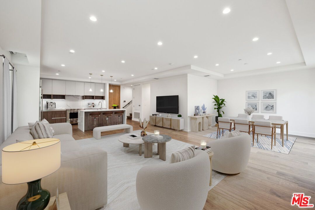 Dining room, Interior, Kitchen, Living room, Pendant Lights, Recessed Lighting, Stainless Steel Appliances, Wood Texture Flooring