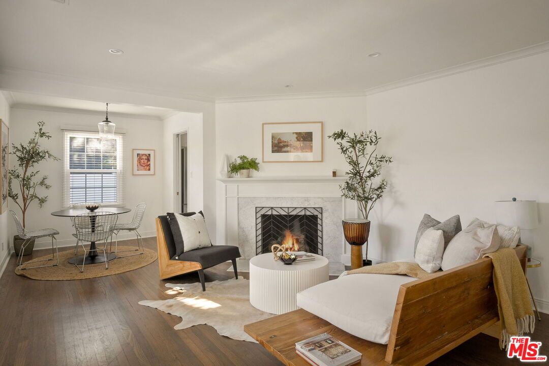 Dining room, Fireplace, Interior, Living room, Pendant Lights, Recessed Lighting, Wood Texture Flooring