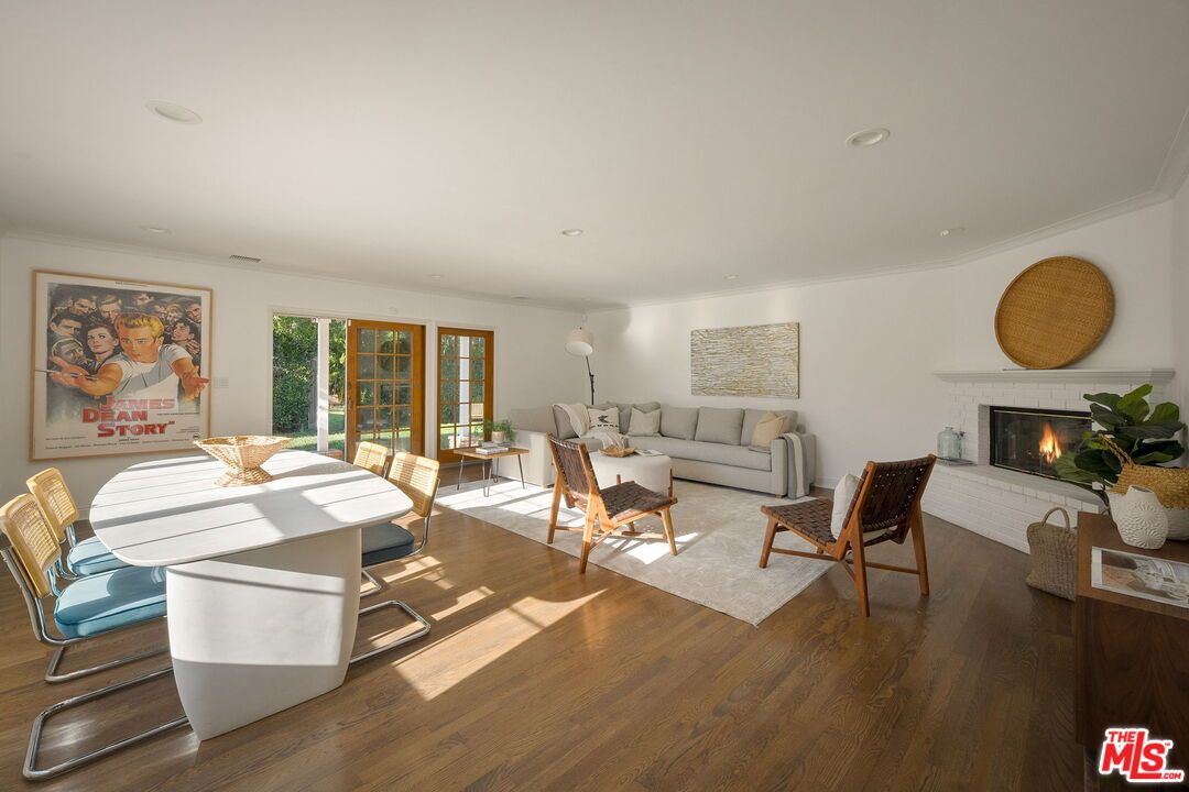 Dining room, Fireplace, Interior, Living room, Recessed Lighting, Wood Texture Flooring