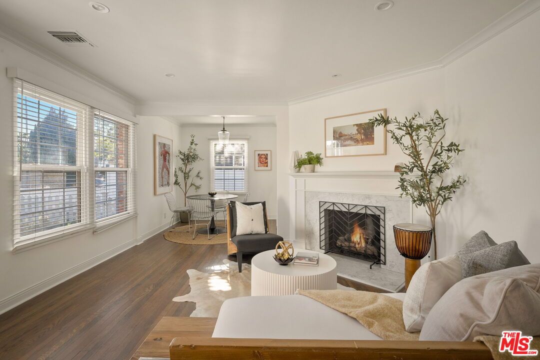Dining room, Fireplace, Interior, Living room, Pendant Lights, Recessed Lighting, Wood Texture Flooring