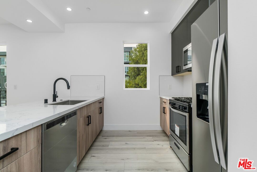 Interior, Kitchen, Recessed Lighting, Stainless Steel Appliances, Wood Texture Flooring
