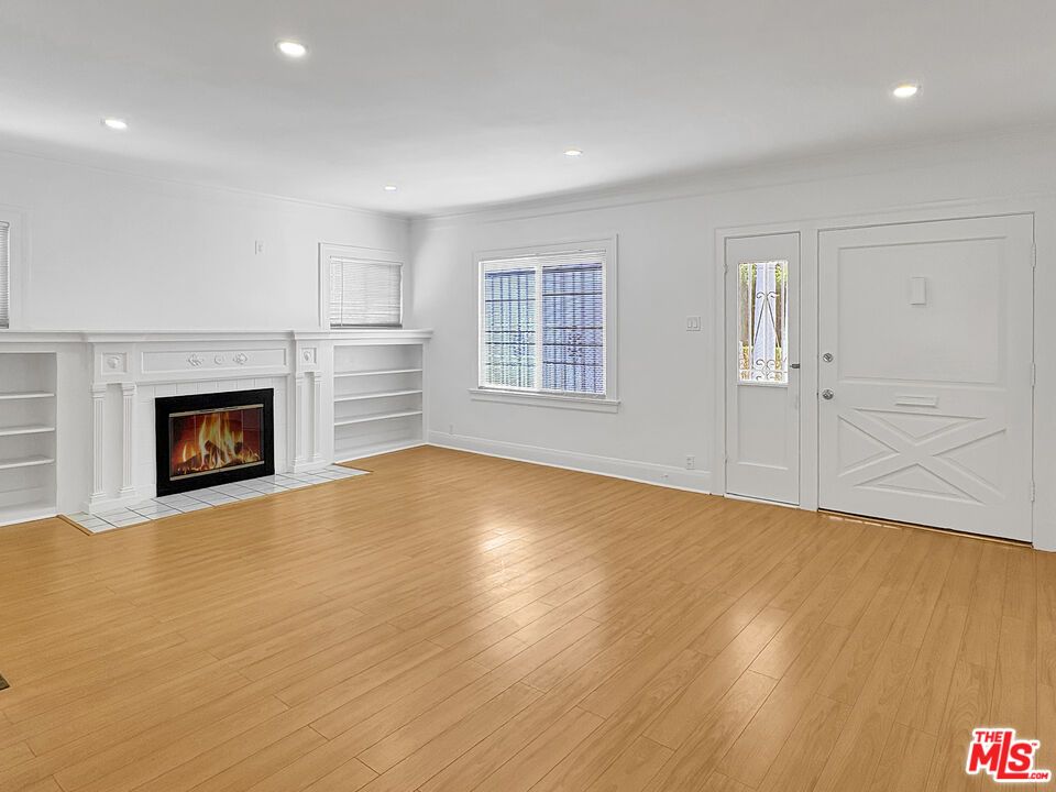 Empty room, Fireplace, Interior, Recessed Lighting, Wood Texture Flooring