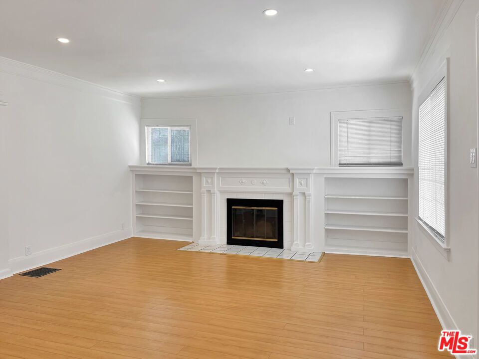 Empty room, Fireplace, Interior, Recessed Lighting, Wood Texture Flooring