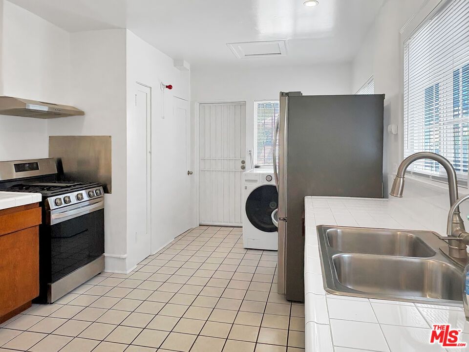 Interior, Kitchen, Tile Countertops, Washer
