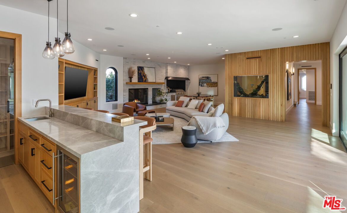 Fireplace, Interior, Kitchen, Living room, Pendant Lights, Recessed Lighting, Wood Texture Flooring, Wooden Walls