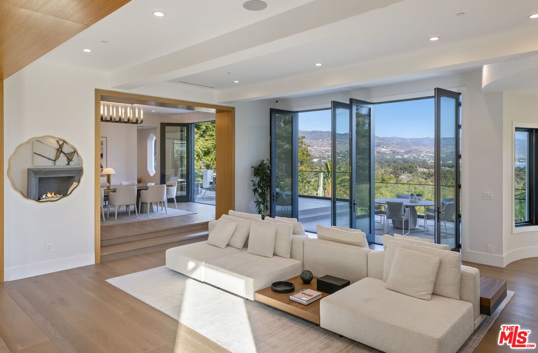Chandelier, Dining room, Fireplace, Interior, Living room, Recessed Lighting, Wood Texture Flooring